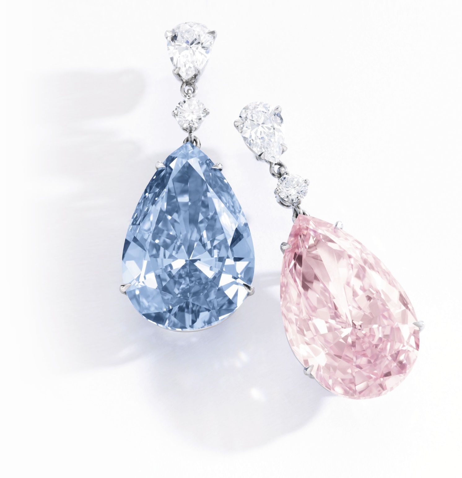 16-carat, pear-shaped Artemis Pink + 14.54 carat, pear-shaped Apollo Blue